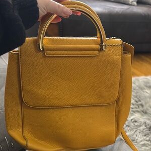 Yellow mustard Back Pack Purse
Vegan leather